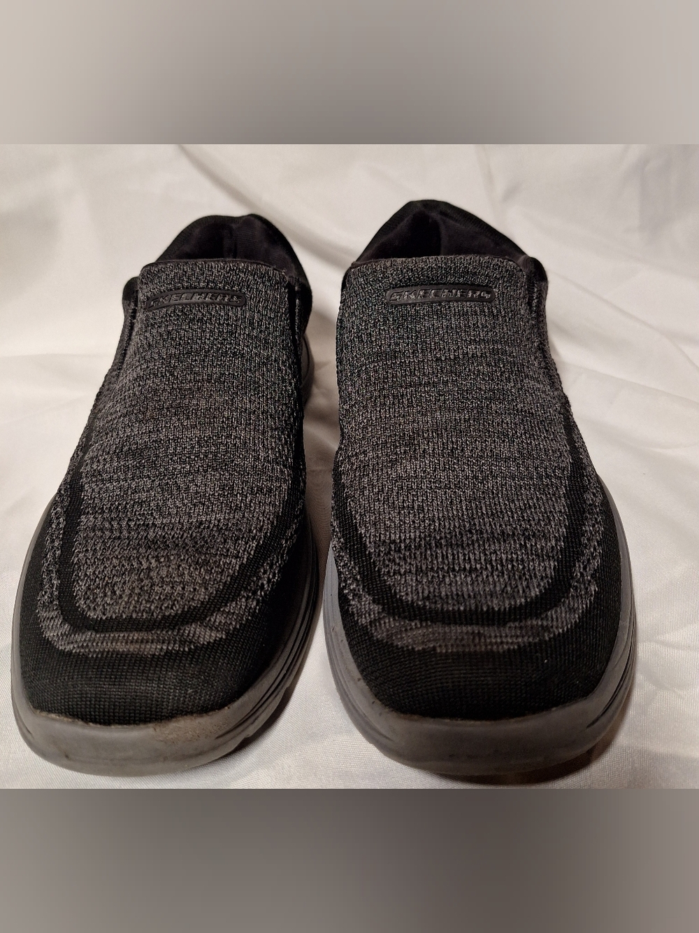 Black and Gray Skechers Men's Arch Fit Motley Vaseo slip-on casual shoes. 11.5